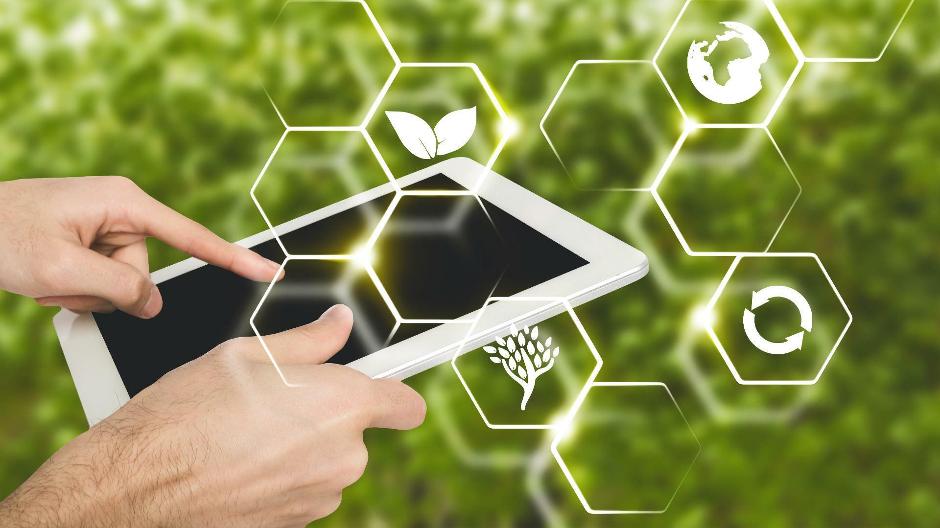 agriculteur tenant une tablette