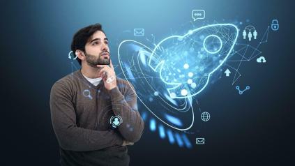 homme et dessin d'une fusée illustrant la création d'entreprise