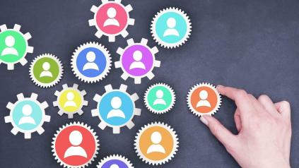 assemblage de roues crantées représentant le travail collectif